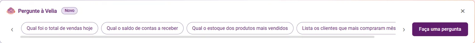 Faixa Pergunte à Velia no dashboard, com sugestões de pergunta e o botão Faça uma pergunta