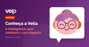 Mascote da Velia, assistente de IA do Velo, dentro de um balão de conversa, ao lado do título Conheça a Velia
